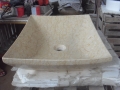 Lavabo de baño de mármol beige de forma rectangular