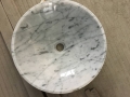 Lavabo y fregadero de mármol de carrara blanco de forma redonda